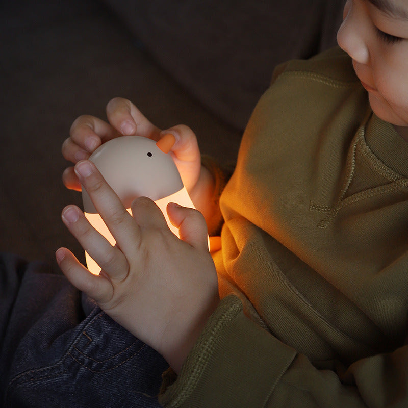 Pecking chicken with sleeping light